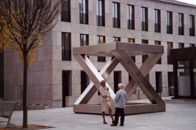 People conferring next to another contemporary sculpture which is near the Postal Museum in Vaduz.