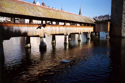 Close-up of the covered wooden Chapel Bridge (constructed in 1333). It was designed to protect the city of Lucerne from attacks.