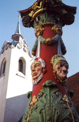 More gothic mask-like faces of the Fritschi-style fountain.
