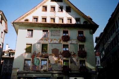 Typical Lucerne house with a fresco and flower boxes (in November).