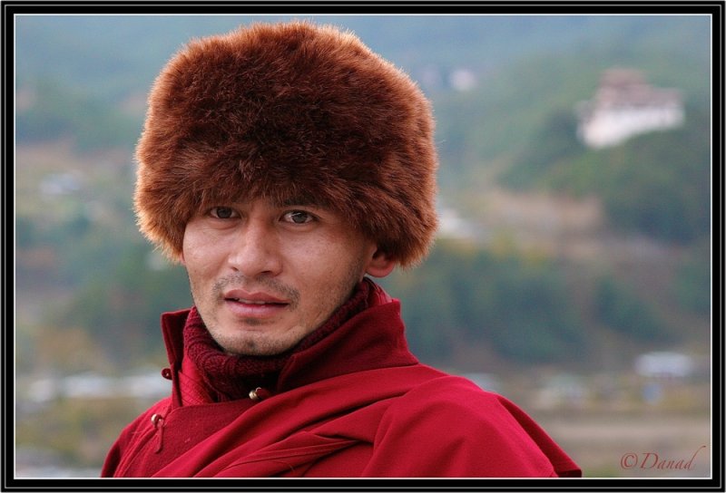 A Monk well covered for the cold autumn wind.