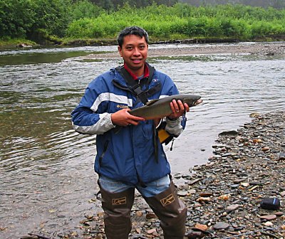 Rey with 24 inch trout.jpg