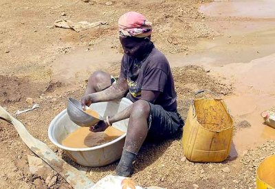 Gold mining child at Kassola, near Tibl, Centre-Sud Region, Burkina Faso