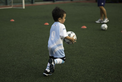 James playing football