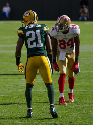 Charles Woodson (21), Randy Moss (84)