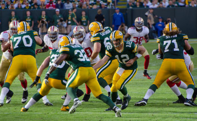 Aaron Rodgers (12), Cedric Benson (32)