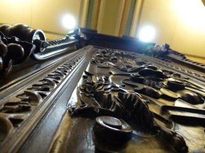 Wooden case of clock, looking up