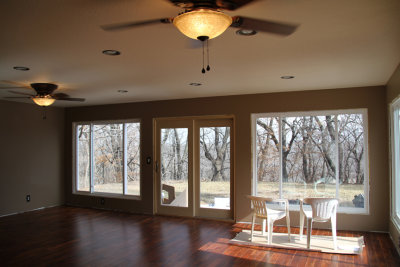 Living Room with Lighted Ceiling Fans