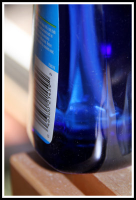 Blue Light through Pledge Bottle