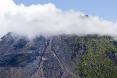 Clouds and lava flows on Arenal.