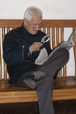 READING THE NEWSPAPER