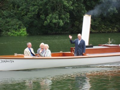 David Suchet waves to us as he passes on way to the festival opening ceremony