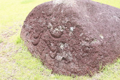Petroglyph on red scoria stone