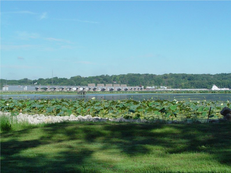 THE BARGE IS JUST ENTERING THE LOCKS AT THE DAM