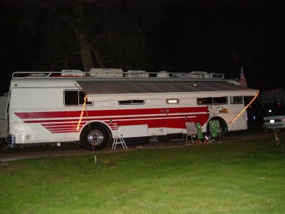 I PURCHASED SOME ROPE LIGHTS THAT I STRUNG UP UNDER THE AWNING AND THE RAILS