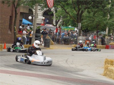 KYLE LEADS THIS GROUP, JUST BEFORE HE FLIPPED THE KART LANDING ON HIS HEAD A FEW HUNDRED FEET AWAY FROM THIS CORNER