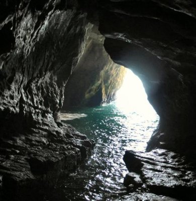 a tourist delight - one of many caves within the white rock.JPG