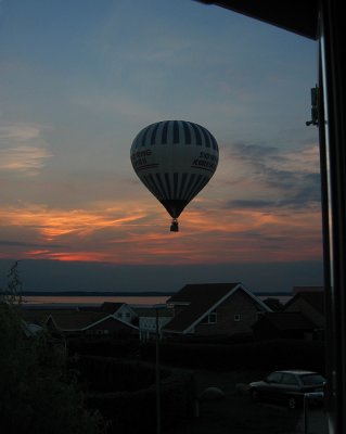 Balloon flying over our house I