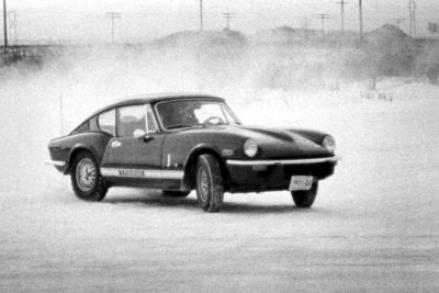 1972 Triumph GT6 ice racing at speed