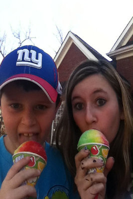 Enjoying snow cones from the ice cream truck