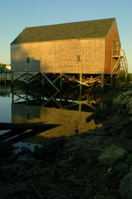 Sunrise On A Boat House