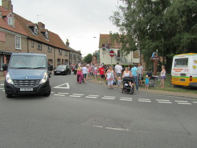 The Stragglers - Crowds Following the Procession