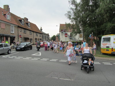 The Stragglers - Crowds Following the Procession