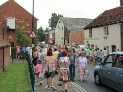 The Stragglers - Crowds Following the Procession