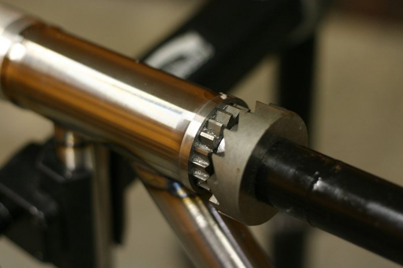 It takes lots of special tools to build a frame right.  This is one of many BOCOMO has.