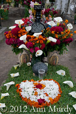 Grave decorated with calla lilies