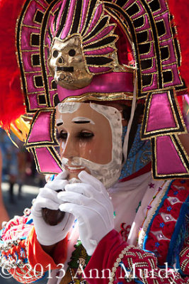 Espaol dancer adjusting headdress