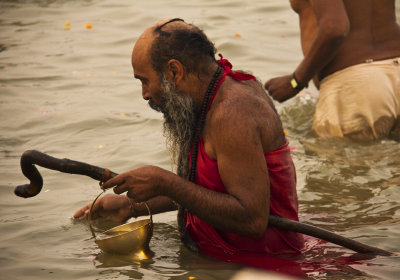 Sadhu in holy river.jpg