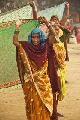 Holding up sarees.jpg