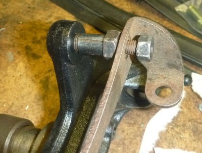 Caliper mount bolt with shim