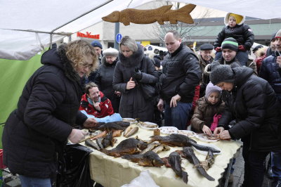 Smoked fish vendor during Uzgavenes (Shrovetide) festival, Vilnius, Feb. 2013