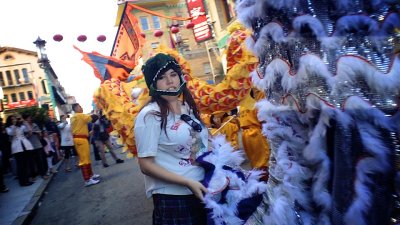 Headline: Girl With Lizard Head Hijacks Lion Dance Tail In Chinatown
