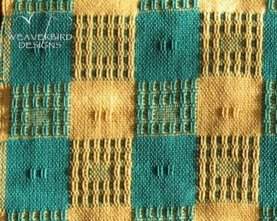 Lace towel, before washing, showing warp floats