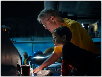 Jim and grandson checking out the Christmas layout