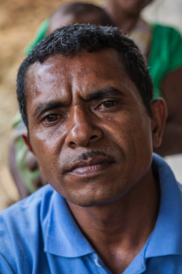 13 portraits of members of the coffee coop 11