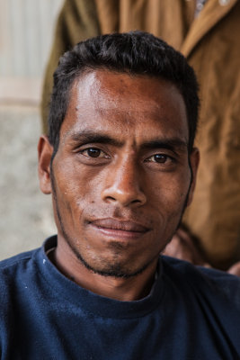 13 portraits of members of the coffee coop 12