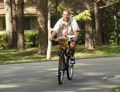 Brooks and dad on the bike