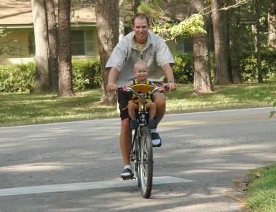 Brooks and dad on the bike