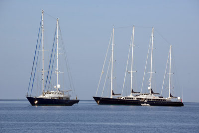 The two-masted sailboat is flying a Vanuatu flag