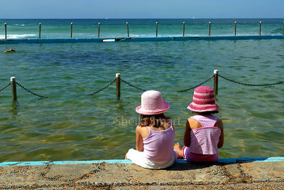 Two little girls at rockpool