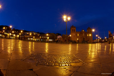 an inscription in the middle of the square