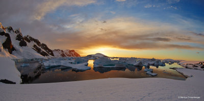 last sunrays over the iceberg cemetery