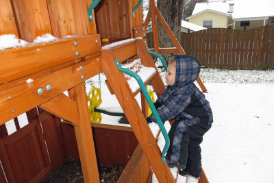 A little snow isn't going to stop me from playing on my swingset.  IMG_0171c.jpg