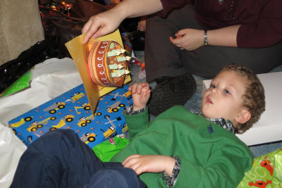 Opening gifts is sooo tiring.   IMG_0163c.jpg