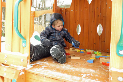 A little snow doesn't stop me from playing with my blocks.   IMG_0234c.jpg