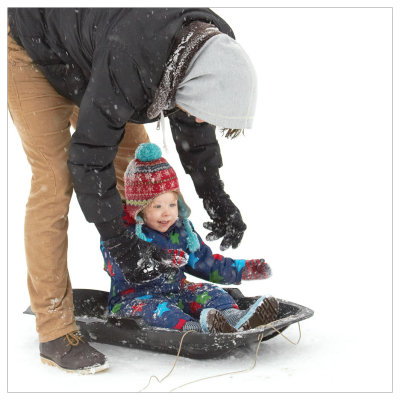 So, daddy tipped me off the sledge...
